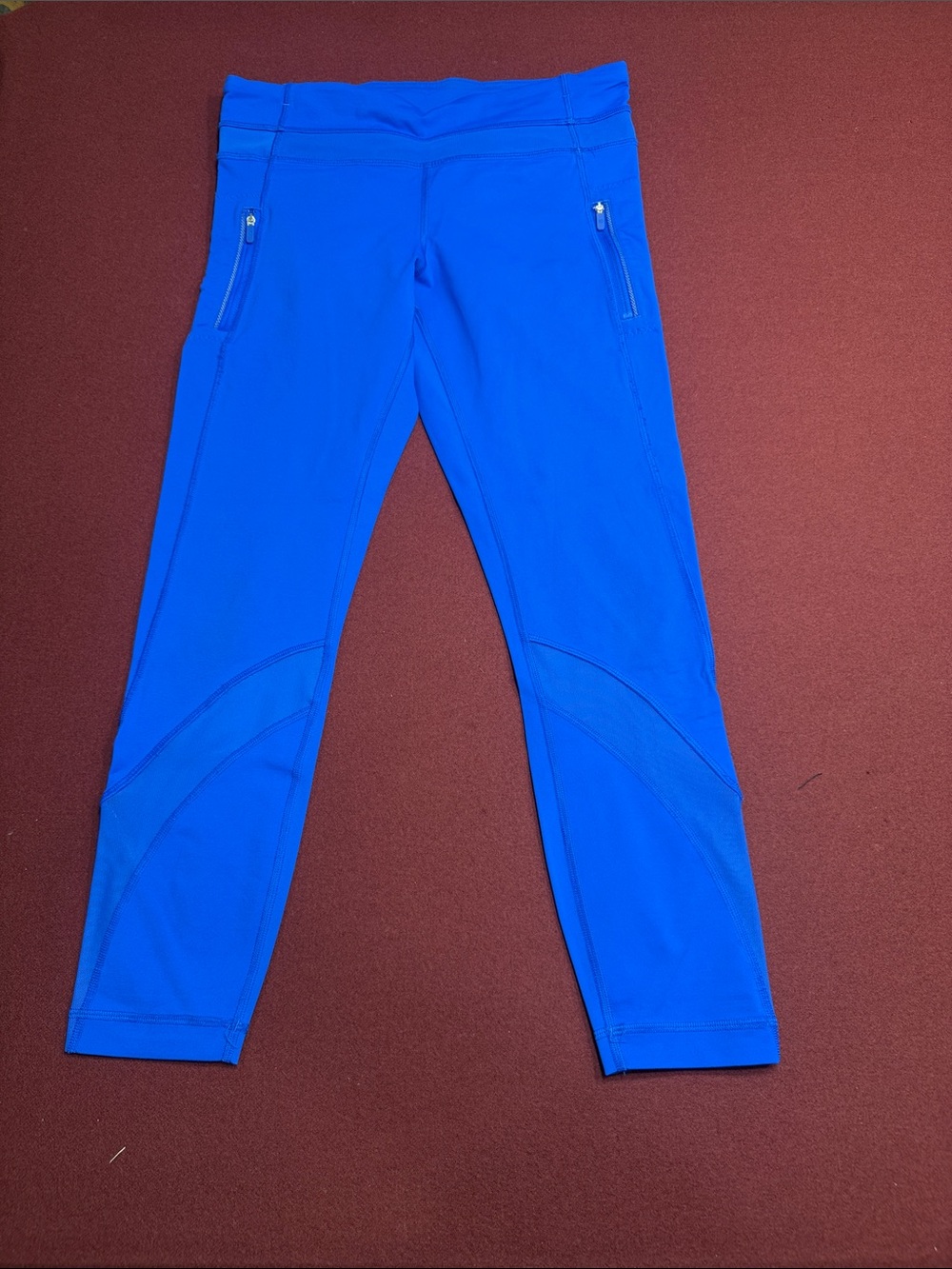 lululemon athletica cobalt blue athletic leggings with zip pockets